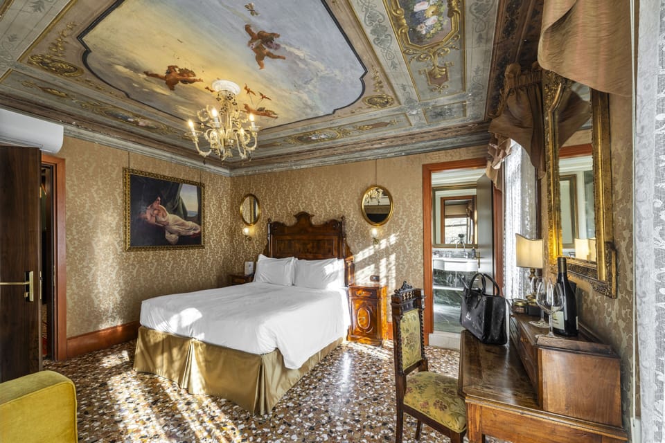 Deluxe Room, Terrace, Canal View | Minibar, in-room safe, desk, soundproofing