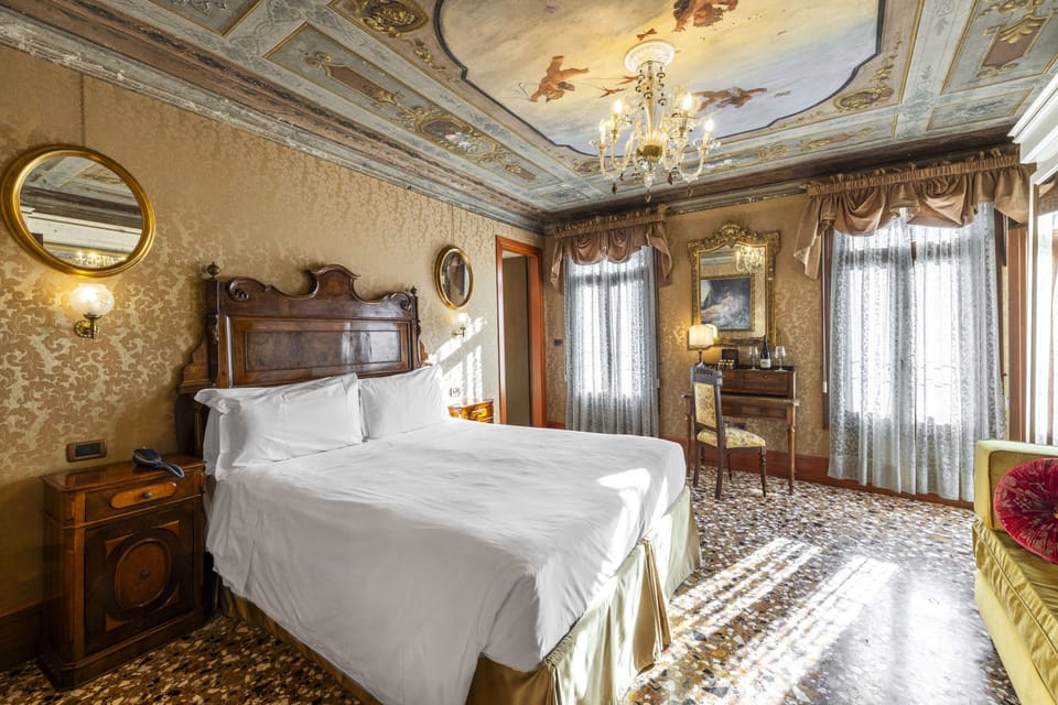 Deluxe Room, Terrace, Canal View | Minibar, in-room safe, desk, soundproofing