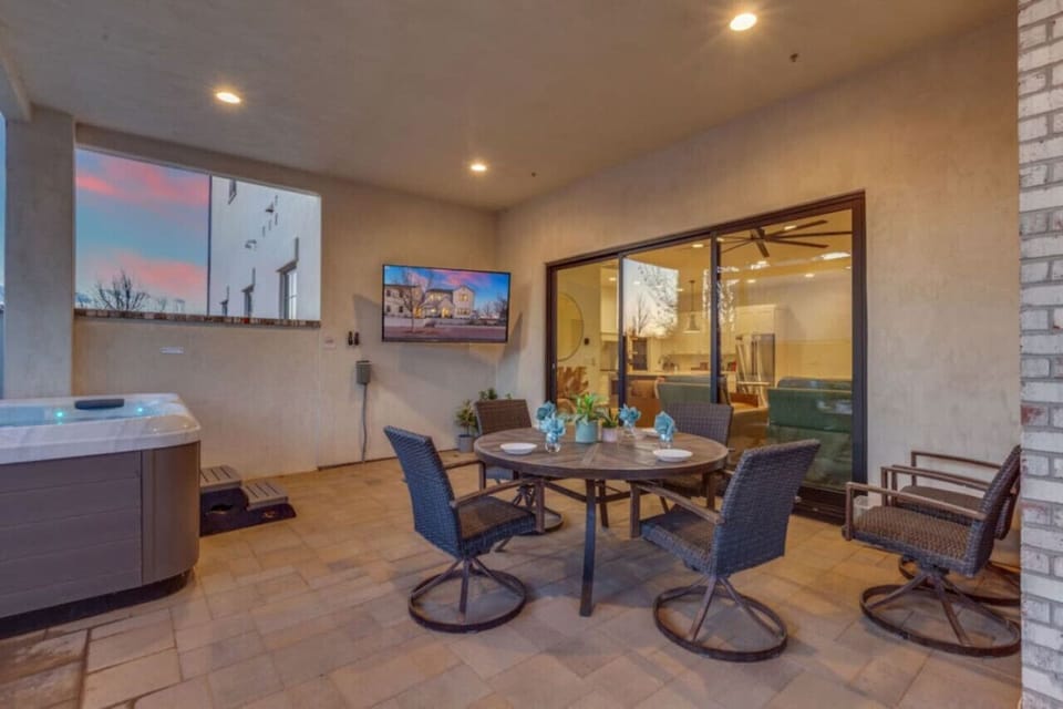 Patio w/ hot tub and outdoor eating