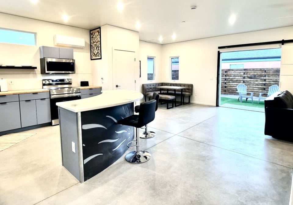 The sliding back door creates an open air element to the home.