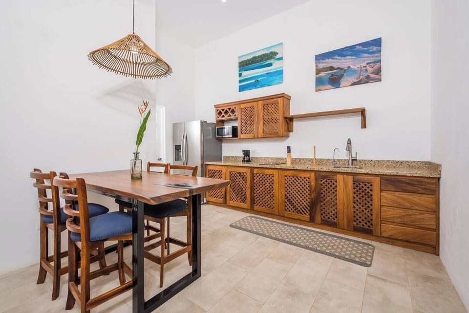 Apartment, Garden View | Living area | 32-inch LED TV with digital channels, pay movies