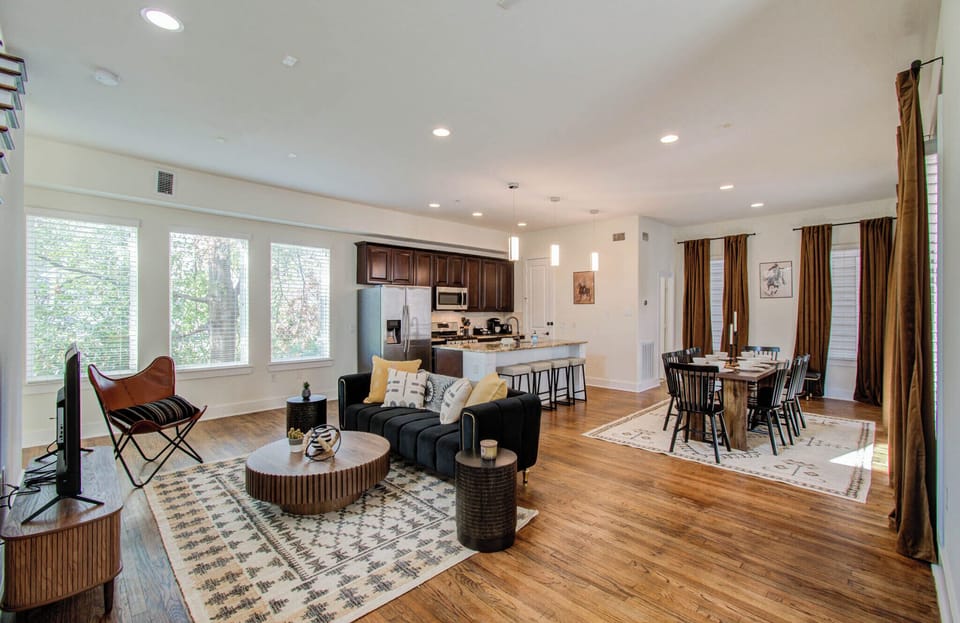 Expansive view of the dining, living room, and kitchen