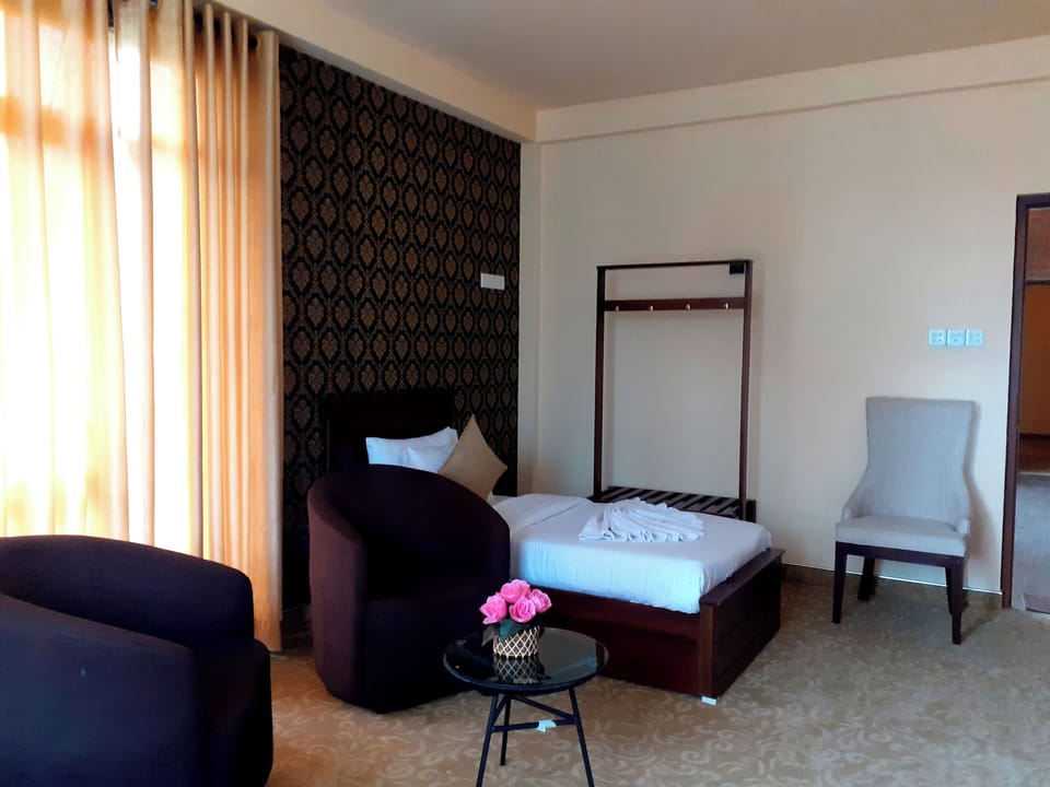 Deluxe Triple Room, Balcony, Mountain View | Soundproofing, free WiFi