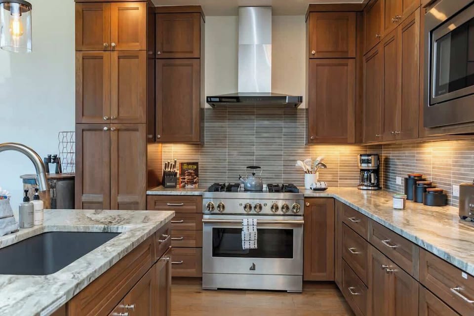 Fully equipped with premium appliances, granite countertops, and custom alder cabinets—this chef’s kitchen is ready for everything from pancake breakfasts to five-star dinners