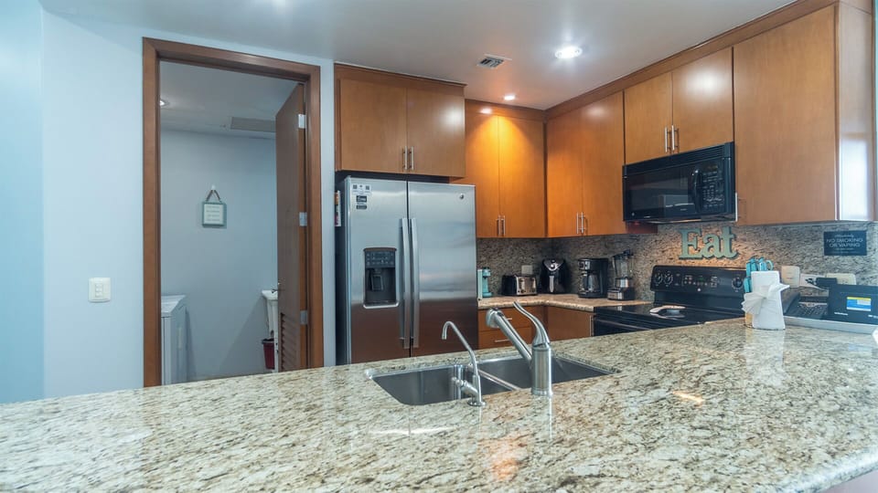 Kitchen counter, and entrance to the utility room.