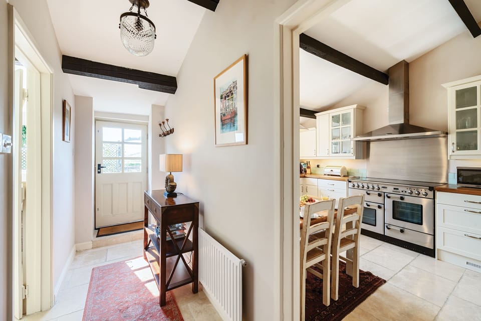 Strand Cottage, Burton Bradstock: A hallway leads through to the back door and garden