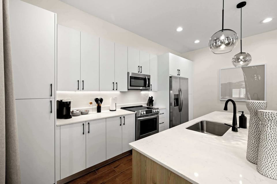 Boasts an abundance of cabinetry, making meal prep and organization a breeze.
