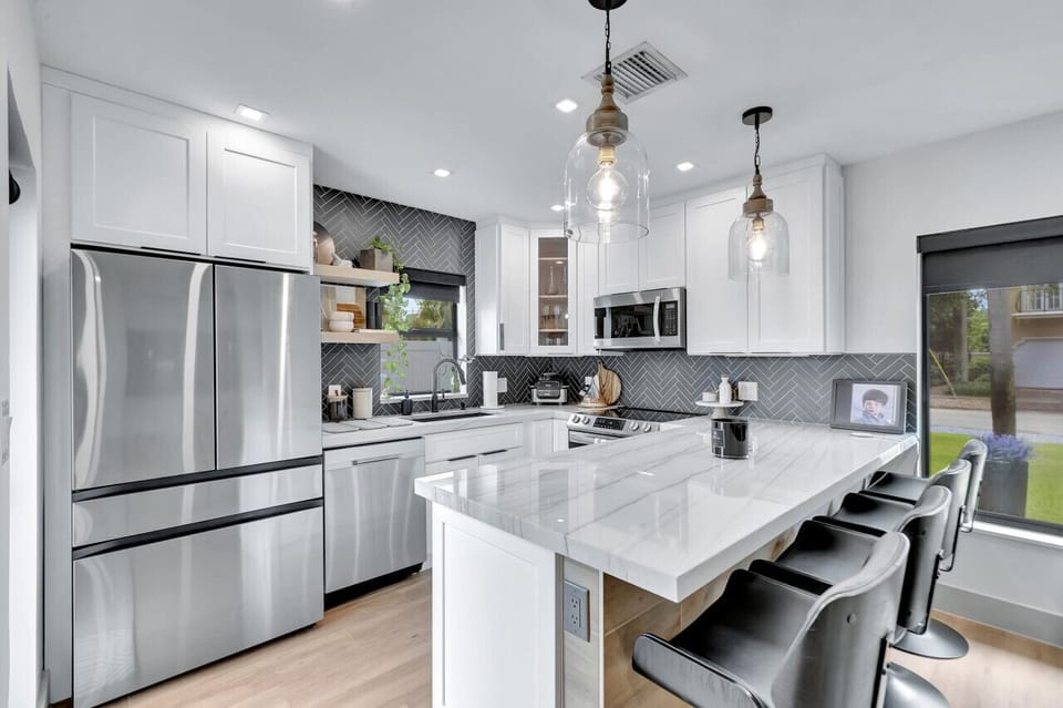 Unit 2’s fully equipped kitchen offers everything you need to whip up delicious meals.