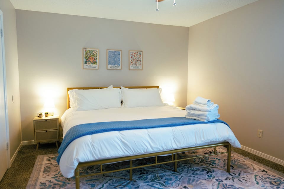 Relax and recharge in this serene bedroom, designed for comfort and restful sleep