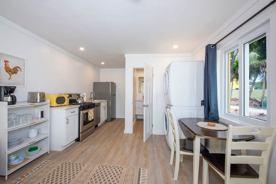 Fully equipped Kitchen area with laundry area.