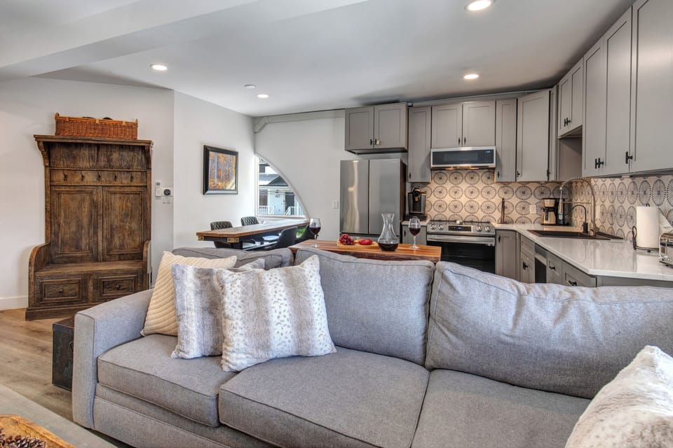 The open concept floor plan - kitchen, dining area, and living area.