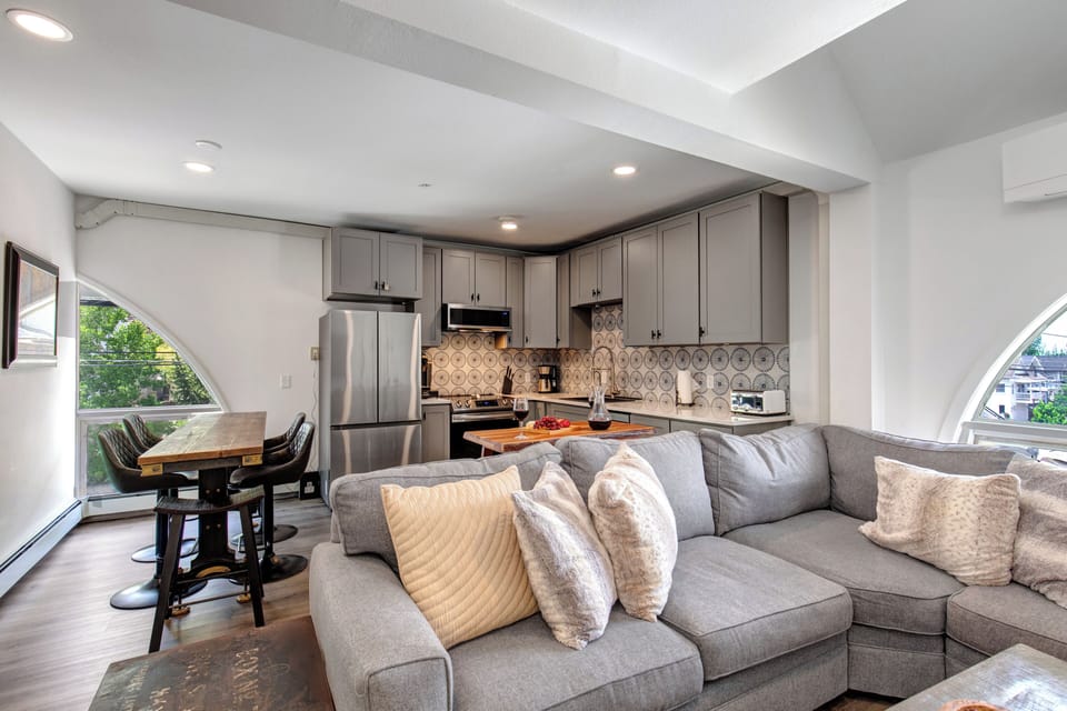 The open concept floor plan - kitchen, dining area, and living area.