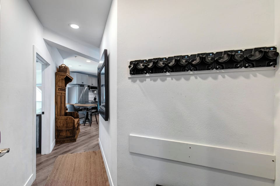 The main entry door with an area to hand coats and put shoes.