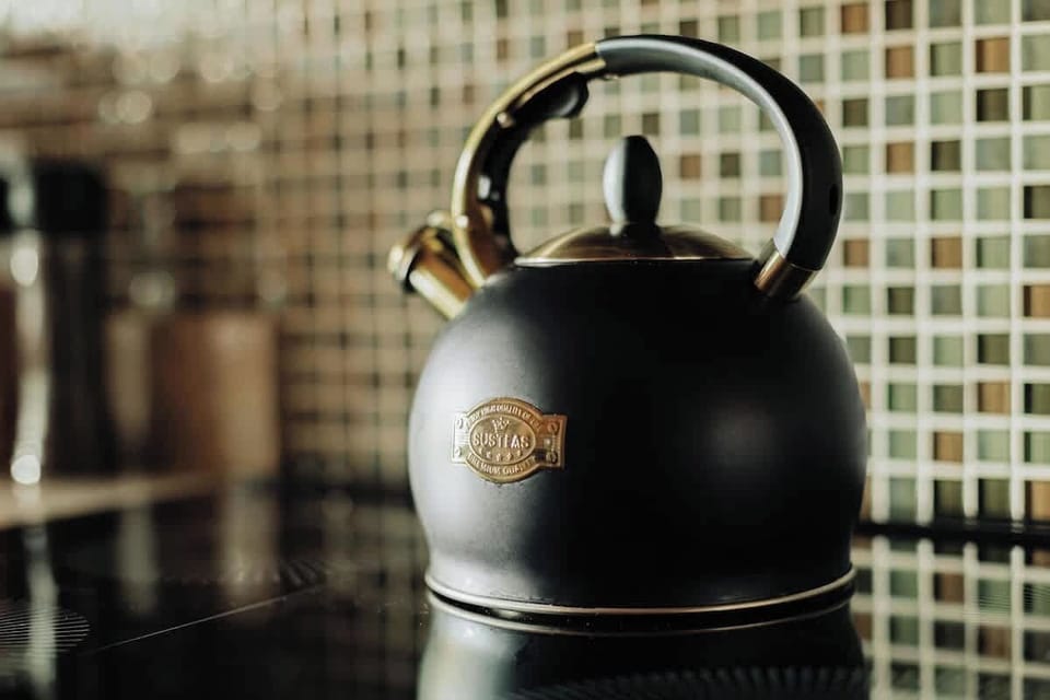 Start your morning right with the elegant kettle, ready to brew your perfect cup of tea or coffee in the stylish kitchen.
