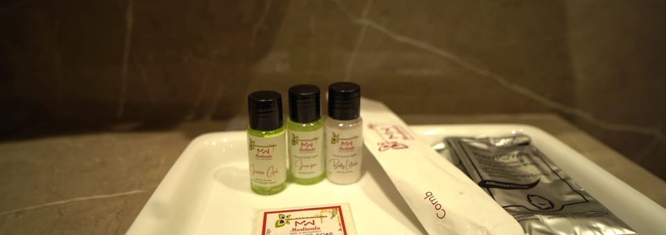 Shower, slippers, towels, soap