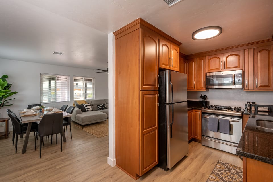 Full kitchen features a coffee maker, basic cooking essentials