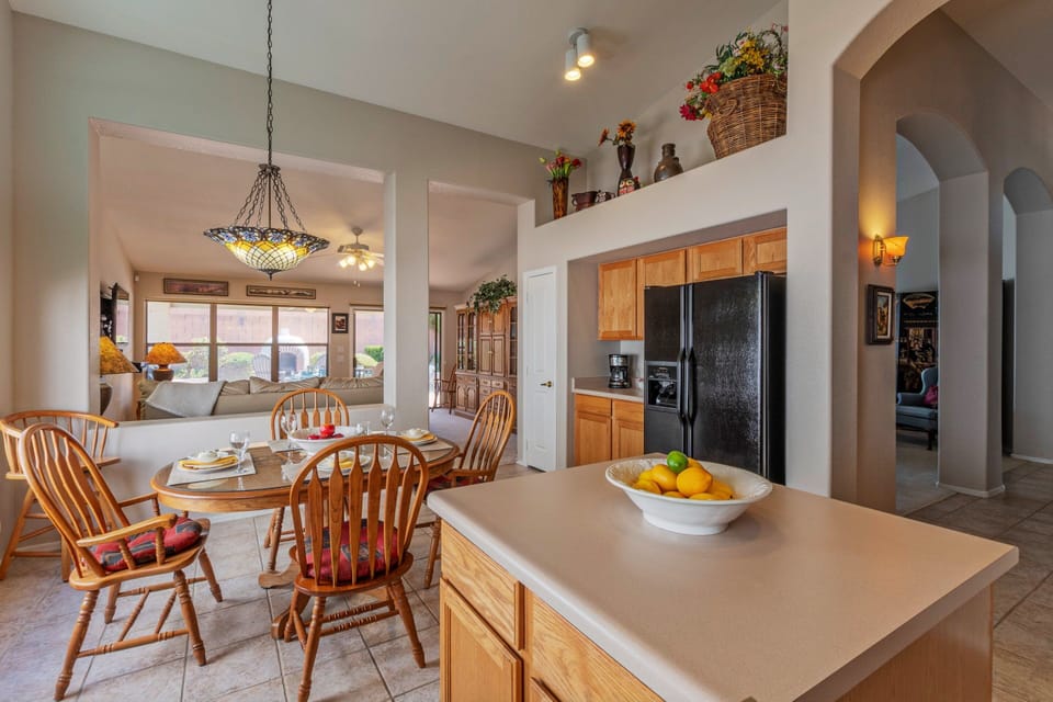 Serve snacks and drinks on the kitchen island.
