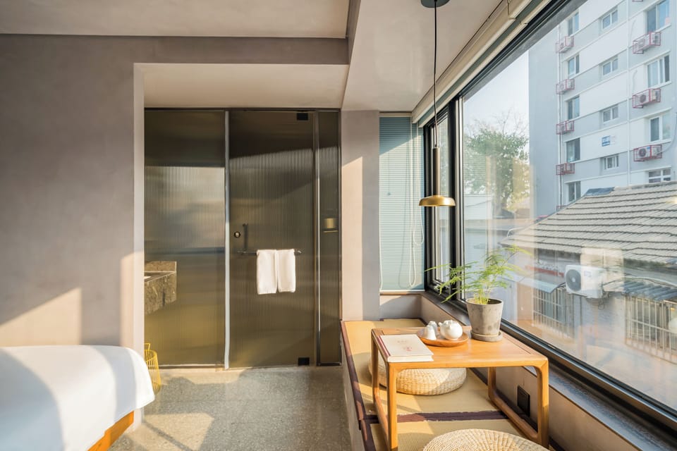 Comfort Room | Desk, laptop workspace, blackout drapes, soundproofing