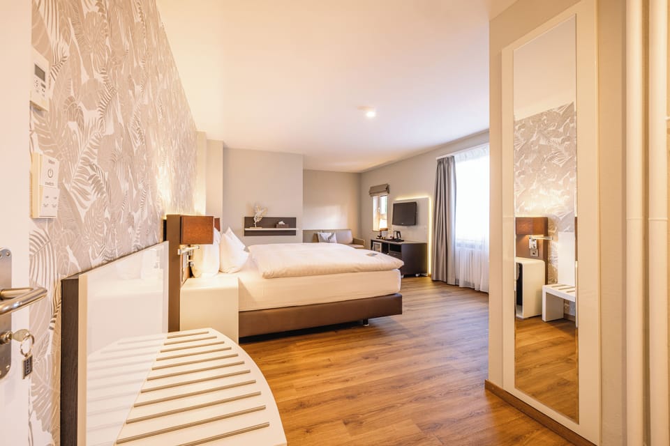 Premium bedding, down comforters, pillowtop beds, minibar