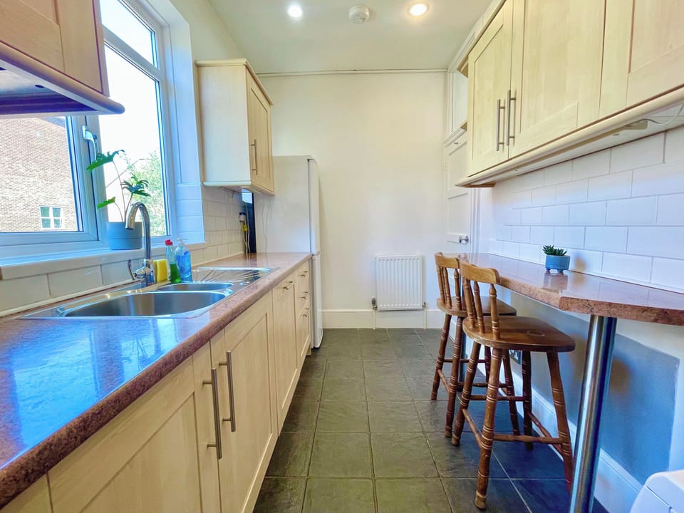 Fully equipped modern kitchen in stylish and spacious Hammersmith flat