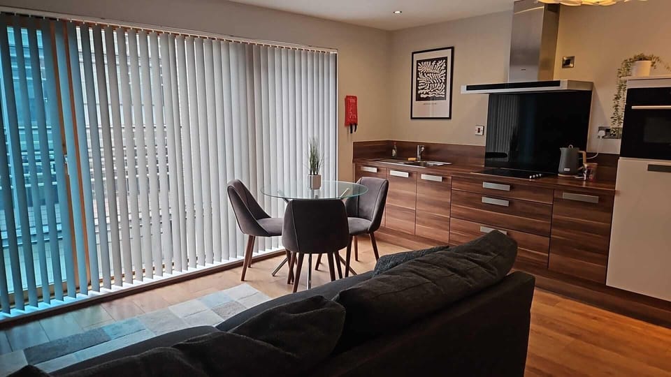 Standard Apartment, Non Smoking | Living area | Flat-screen TV