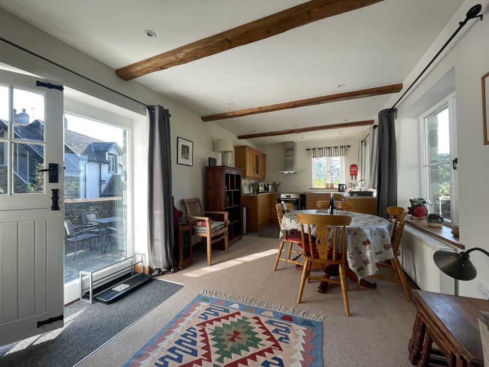 This light and airy room makes the perfect space to cook and dine with delightful views looking toward the fells and Borrowdale Valley