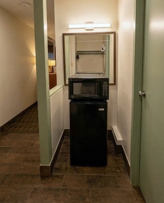 Standard Double Room, 2 Queen Beds, Courtyard View | Desk, laptop workspace, soundproofing, free WiFi