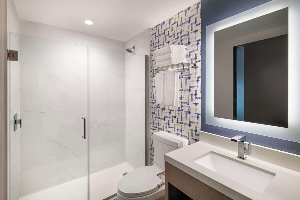 Shower, free toiletries, hair dryer, towels