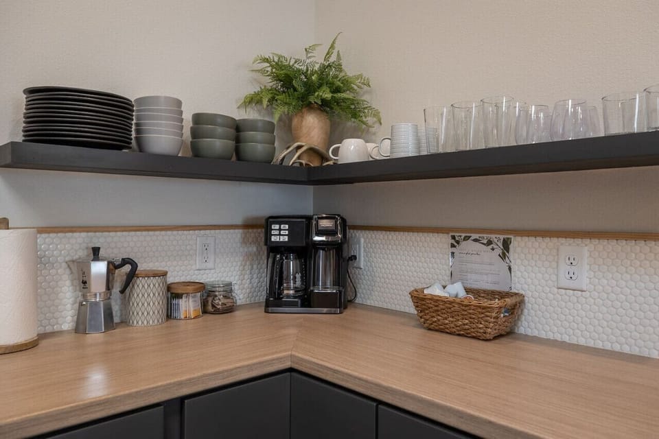 Welcome to our cozy kitchen, thoughtfully designed to meet all your culinary needs! Start your day with a perfect cup of coffee brewed in our convenient coffee maker