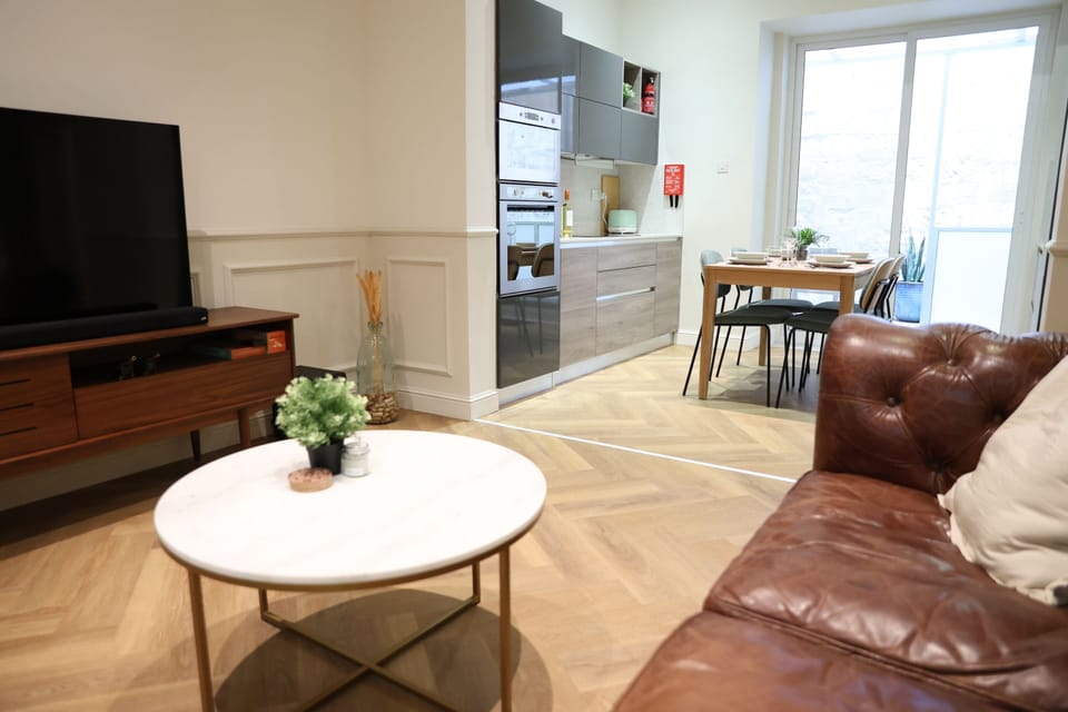 Deluxe Apartment, 2 Bedrooms, Kitchen | Living area | Flat-screen TV