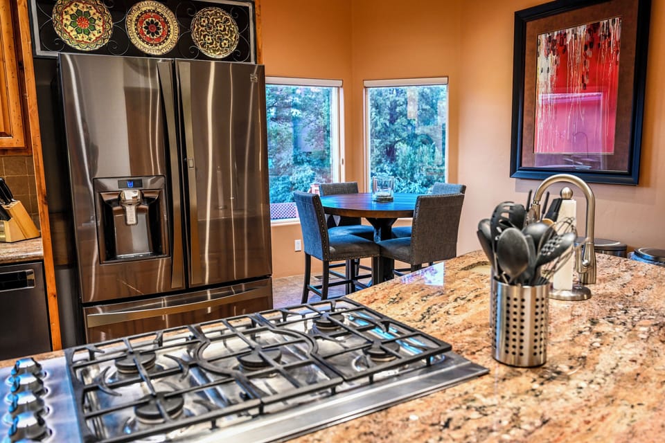 5 burner stove with pop up venting and breakfast nook with seating for 4