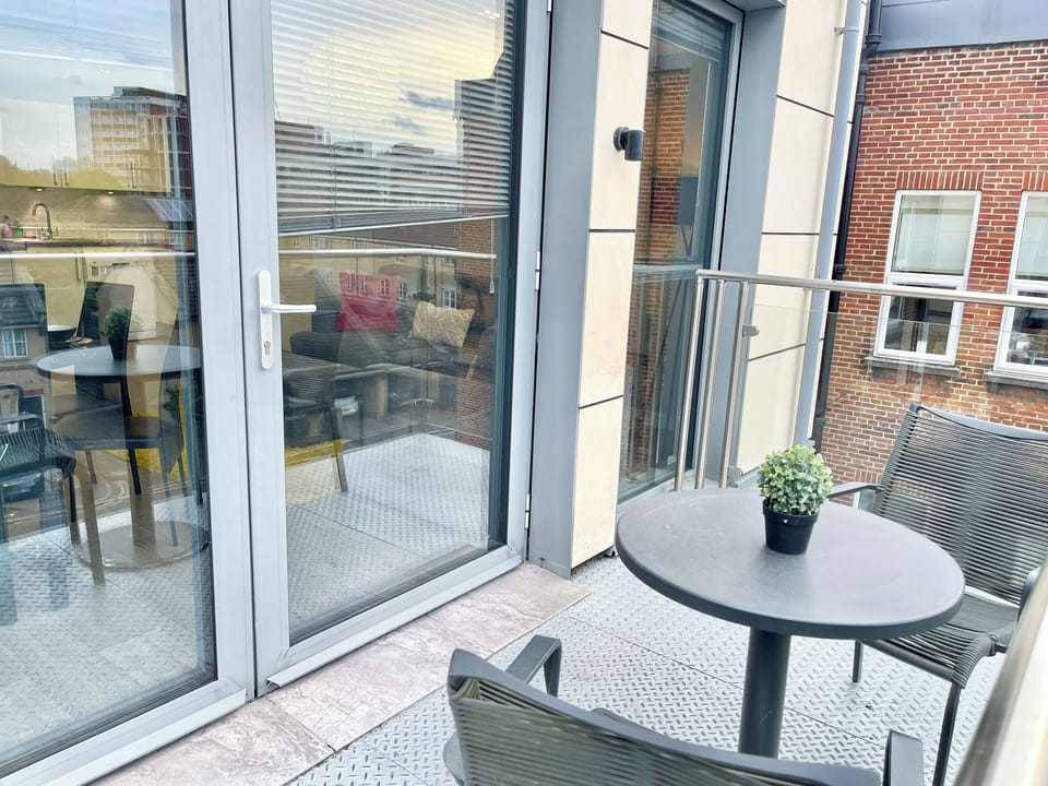 Enjoy a private balcony with seating in this Hoxton flat near Shoreditch 