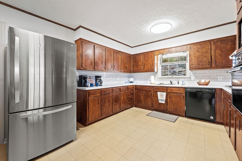 Keurig and drip coffee bar area by the full size fridge 