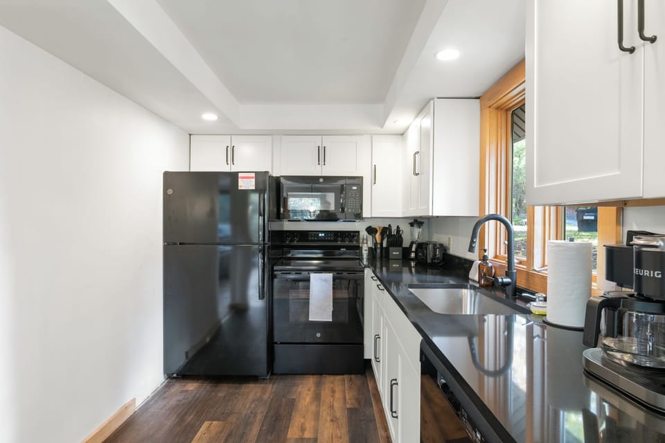 Newly remodeled kitchen, with all new appliances, and tools for cooking meals