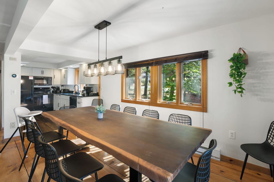 Dining area, seats 12, and newly remodeled kitchen space with all new appliances