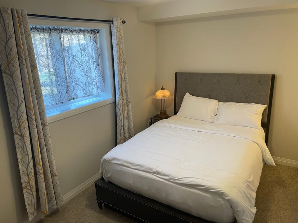 Bedroom 1- Cozy Queen sized bed