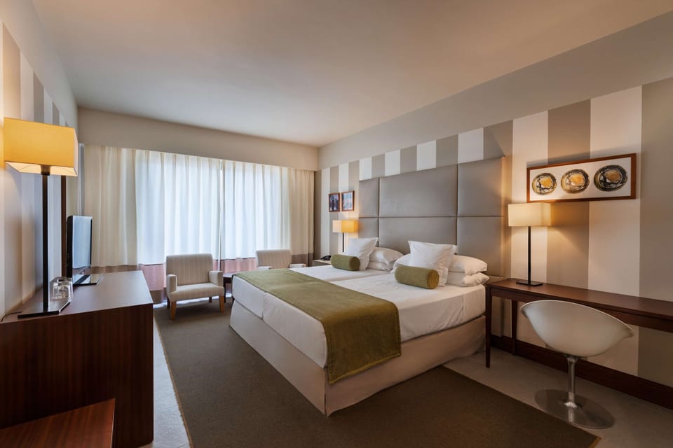Down comforters, minibar, in-room safe, desk