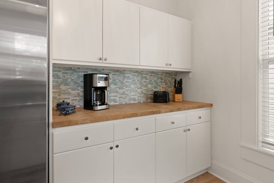 There is no shortage of counter space for food preparation or cabinets for grocery storage.