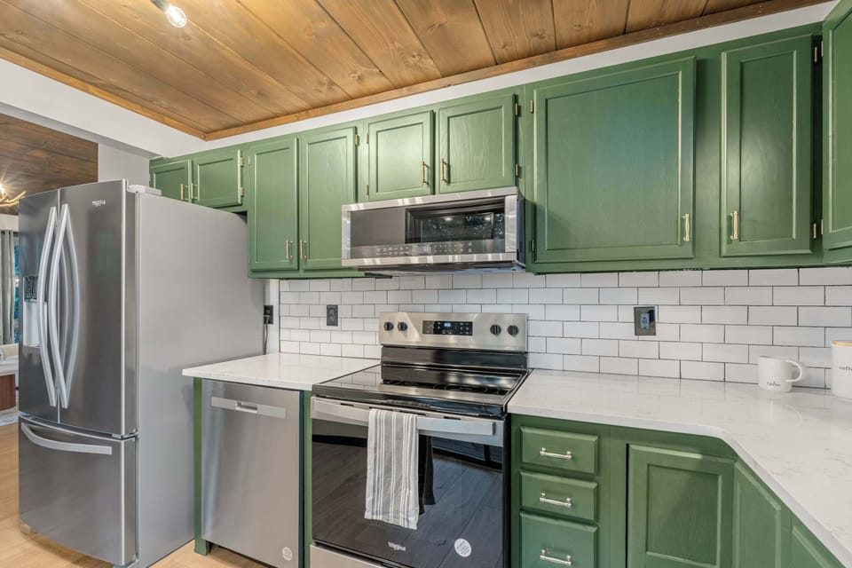 Updated Kitchen with granite countertops and stainless steel appliances