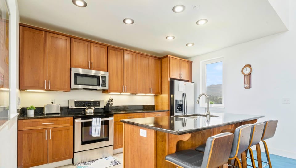 Our kitchen is a blend of classic warmth and modern convenience.