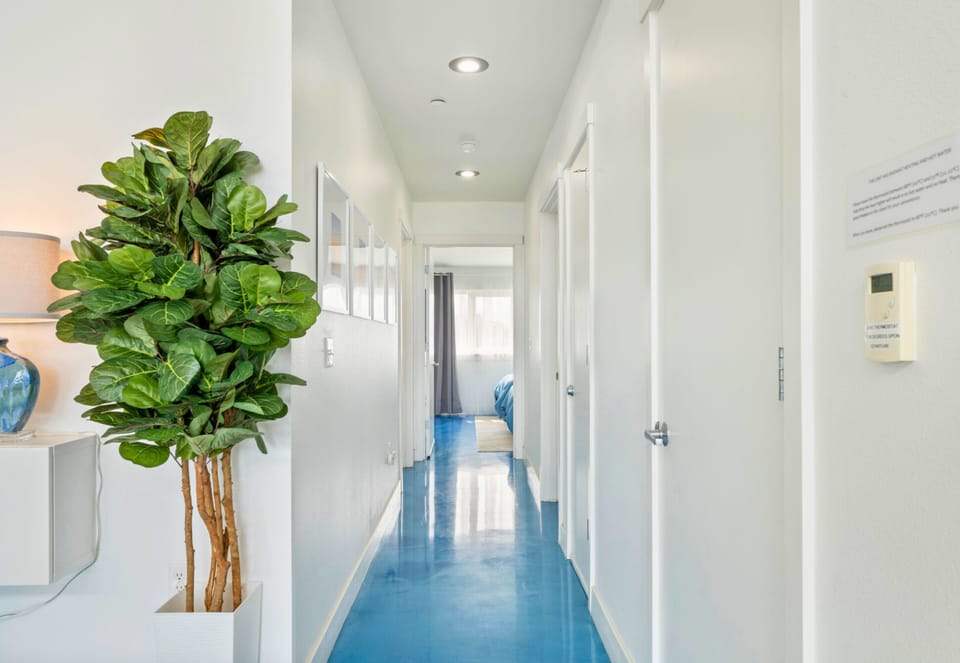 The soothing colors and natural light guide you to each room
