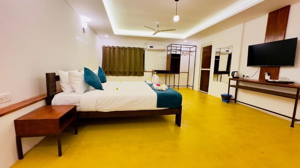Premium bedding, desk, laptop workspace, soundproofing
