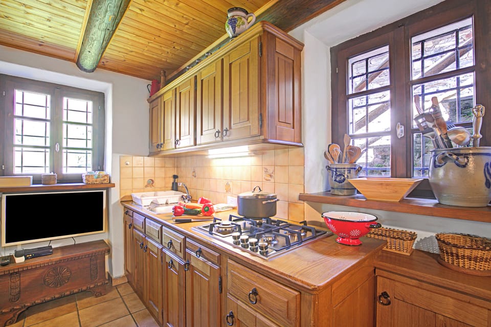 Family Chalet, Multiple Bedrooms, Mountainside (Rustico Ca del Pol) | Private kitchen | Fridge, stovetop, coffee/tea maker, cookware/dishes/utensils