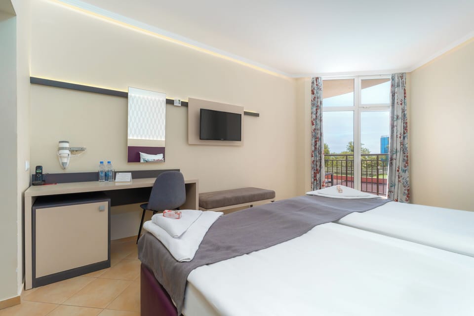 Standard Double or Twin Room, Balcony | In-room safe, desk, blackout drapes, iron/ironing board