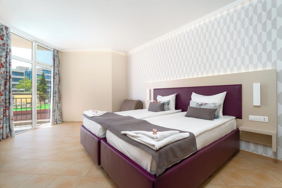 Standard Double or Twin Room, Balcony | In-room safe, desk, blackout drapes, iron/ironing board