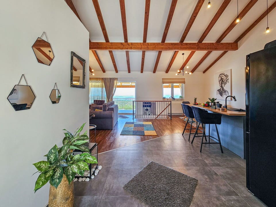 Furniture, Property, Plant, Table, Picture Frame, Houseplant, Wood, Couch, Building, Interior Design