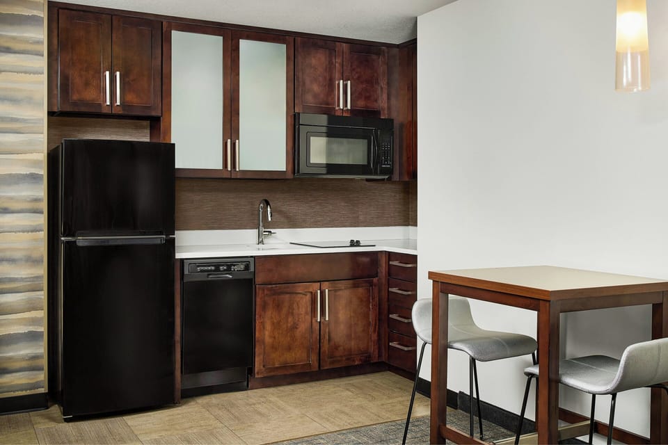 Studio, 1 King Bed with Sofa bed | Private kitchen | Full-size fridge, microwave, stovetop, dishwasher