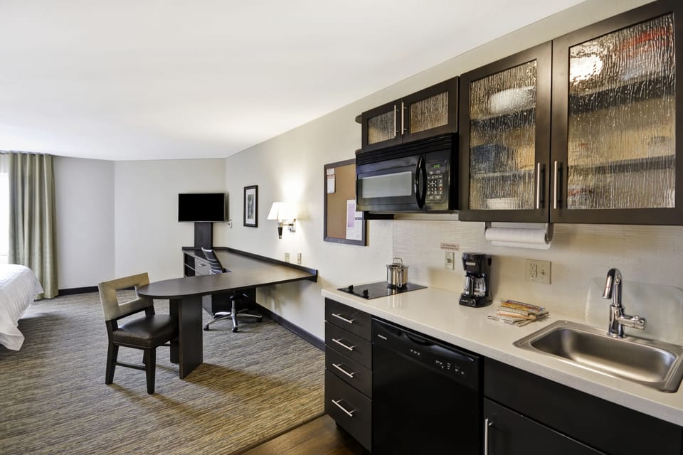 Premium bedding, pillowtop beds, desk, laptop workspace