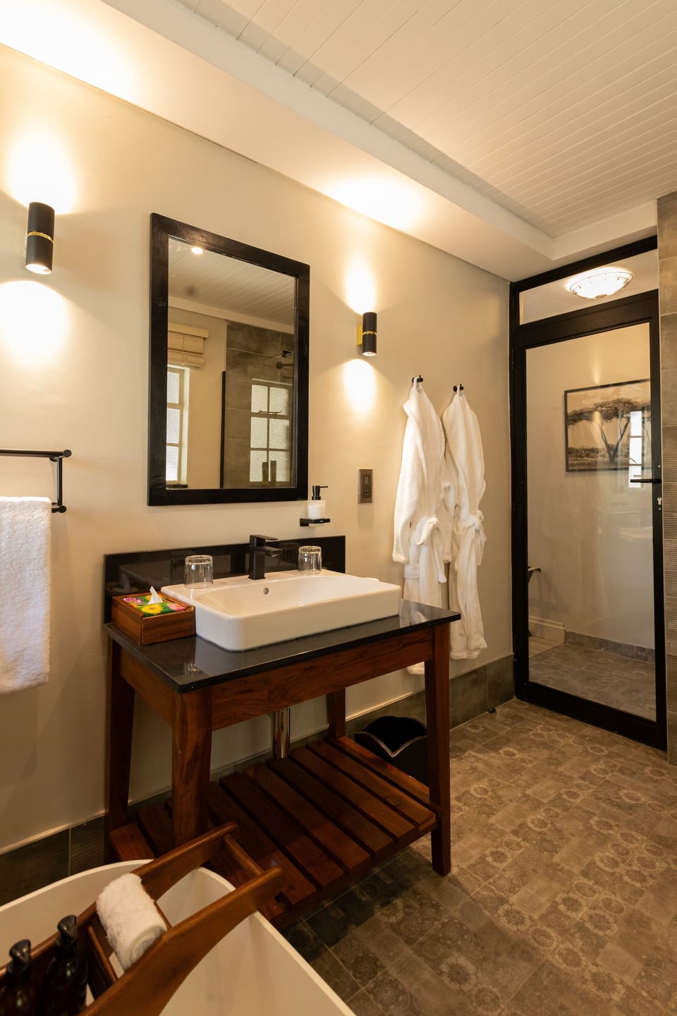 Eco-friendly toiletries, hair dryer, bathrobes, slippers