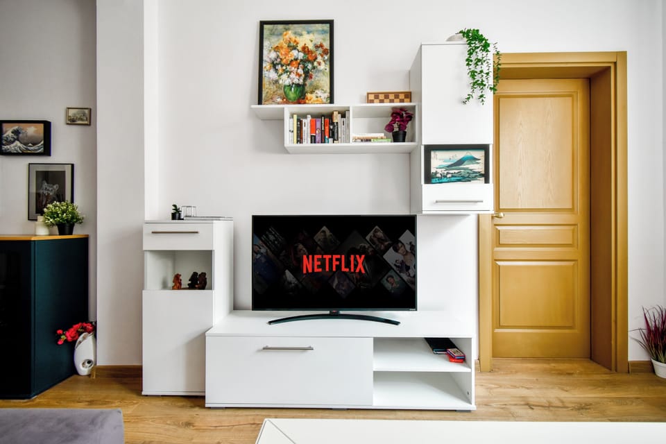 Cozy living room with entertainment at your fingertips. Curious about our streaming options? Ask us!